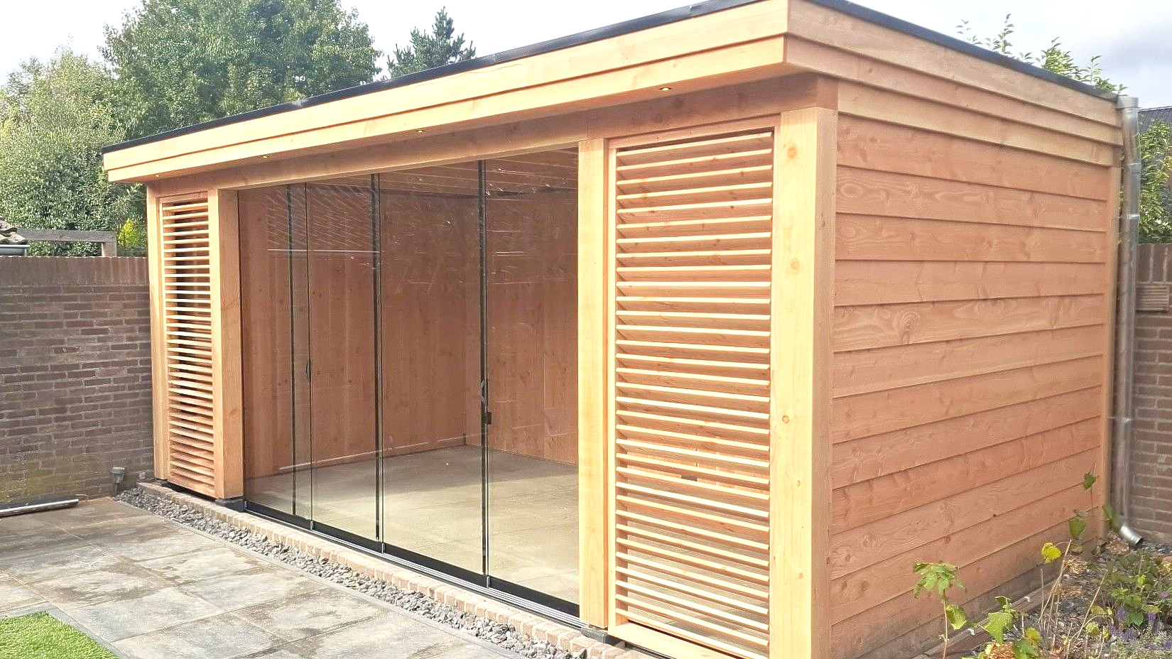 overkapping met shutters Millheeze | Smans Houtbouw