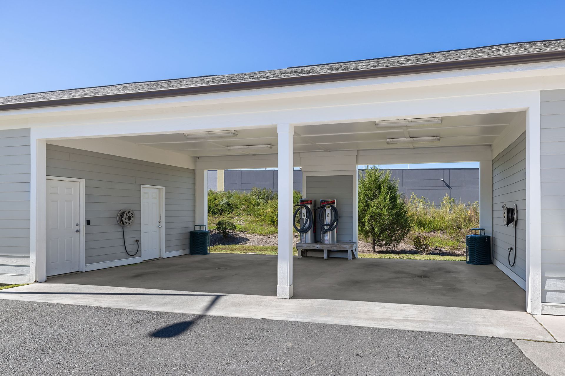 Two car care station at Marquis Ellis Crossing offers apartments for rent near Research Triangle Park, Durham, NC.