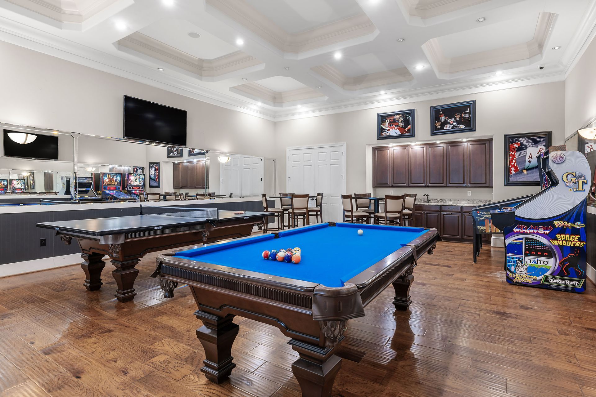 There is a pool table in the middle of the game room at Marquis Ellis Crossing offers apartments for rent near Research Triangle Park, Durham, NC.