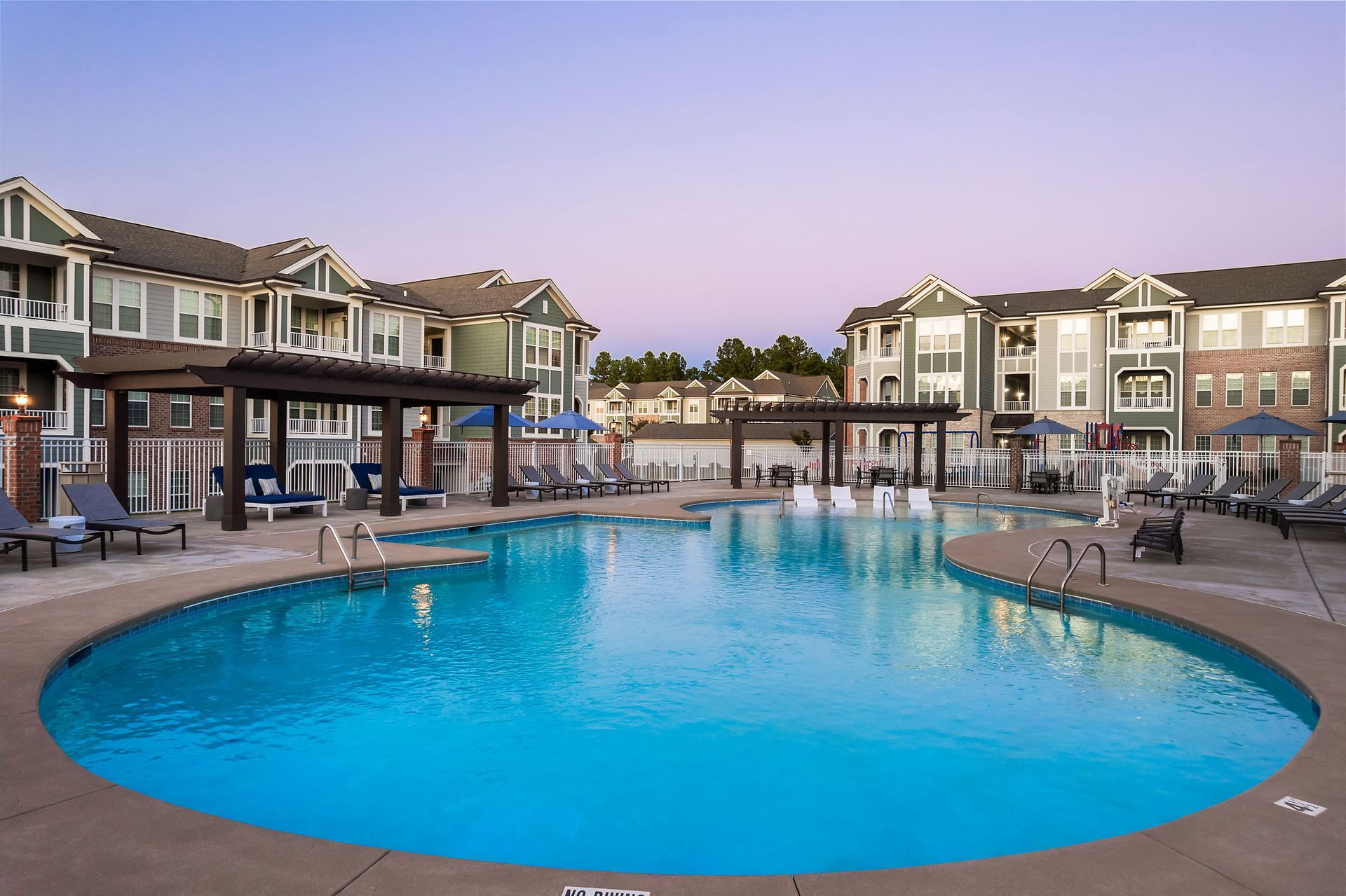 There is a large swimming pool in the middle of the apartment buildings at Marquis Ellis Crossing offers apartments for rent in Durham, NC.