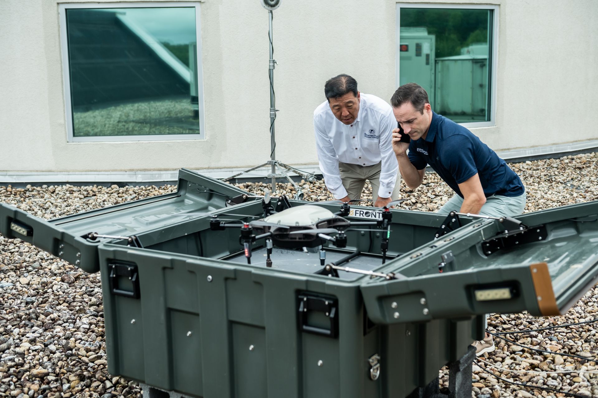 Mark and Nate working with a drone for Triggerhawk