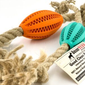 Orange and teal rope dog toys with braided ends and a Good Clean Treats tag on a white background