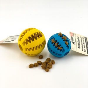 Yellow and blue treat-dispensing pet toys with kibble on a white surface