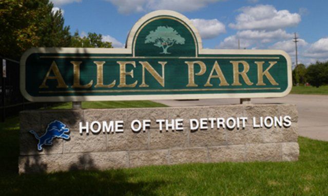 A sign that says allen park home of the detroit lions