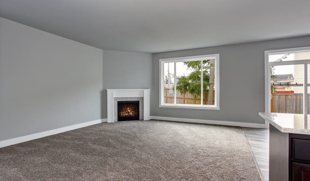 Grey House Interior With Fireplace And Carpet - Carpets in South Burnett, QLD