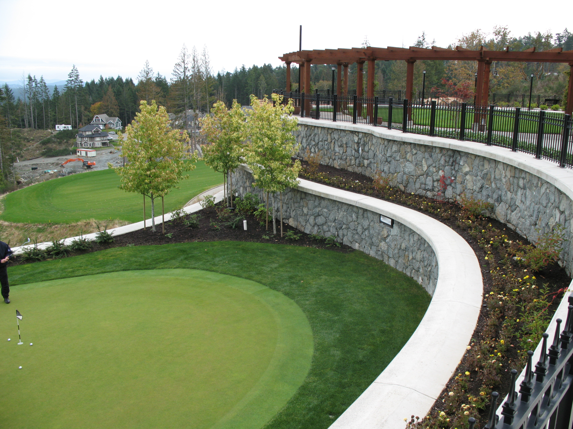 Commercial concrete retaining walls with faced stone Commercial retaining wall constructed for local golf course in Langford BC