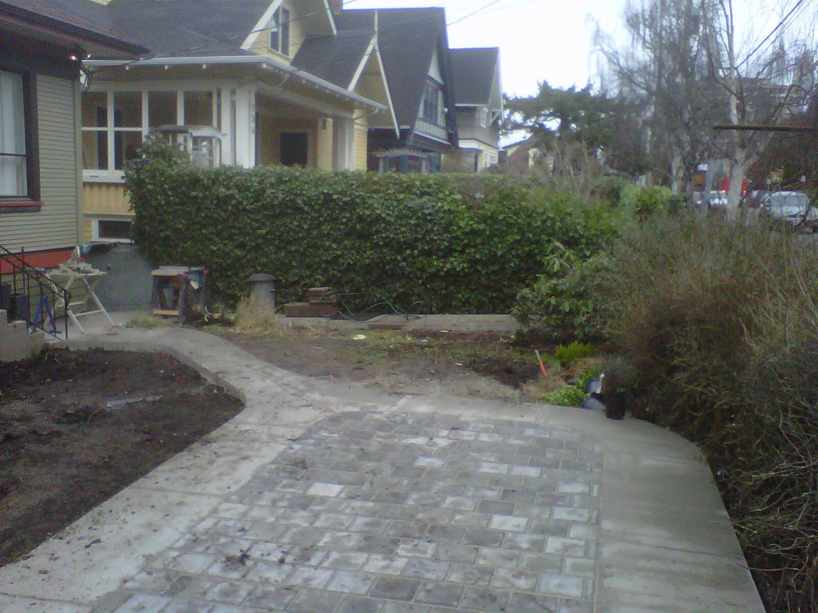 Beautiful residential patio of interlocking pavers constructed by the Victoria landscapers at Larix