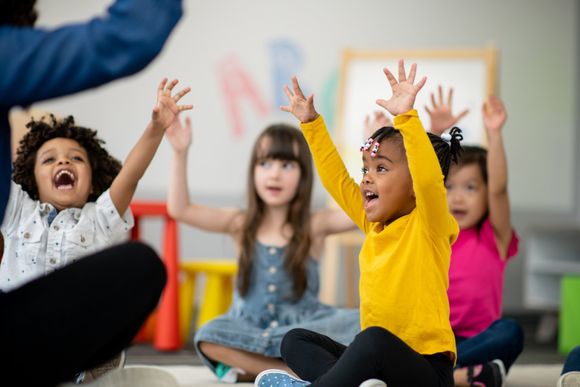 Children Raising Hands — Louisville, KY — Certified Home Care Associates, LLC Children Raising Hands — Louisville, KY — Certified Home Care Associates, LLC