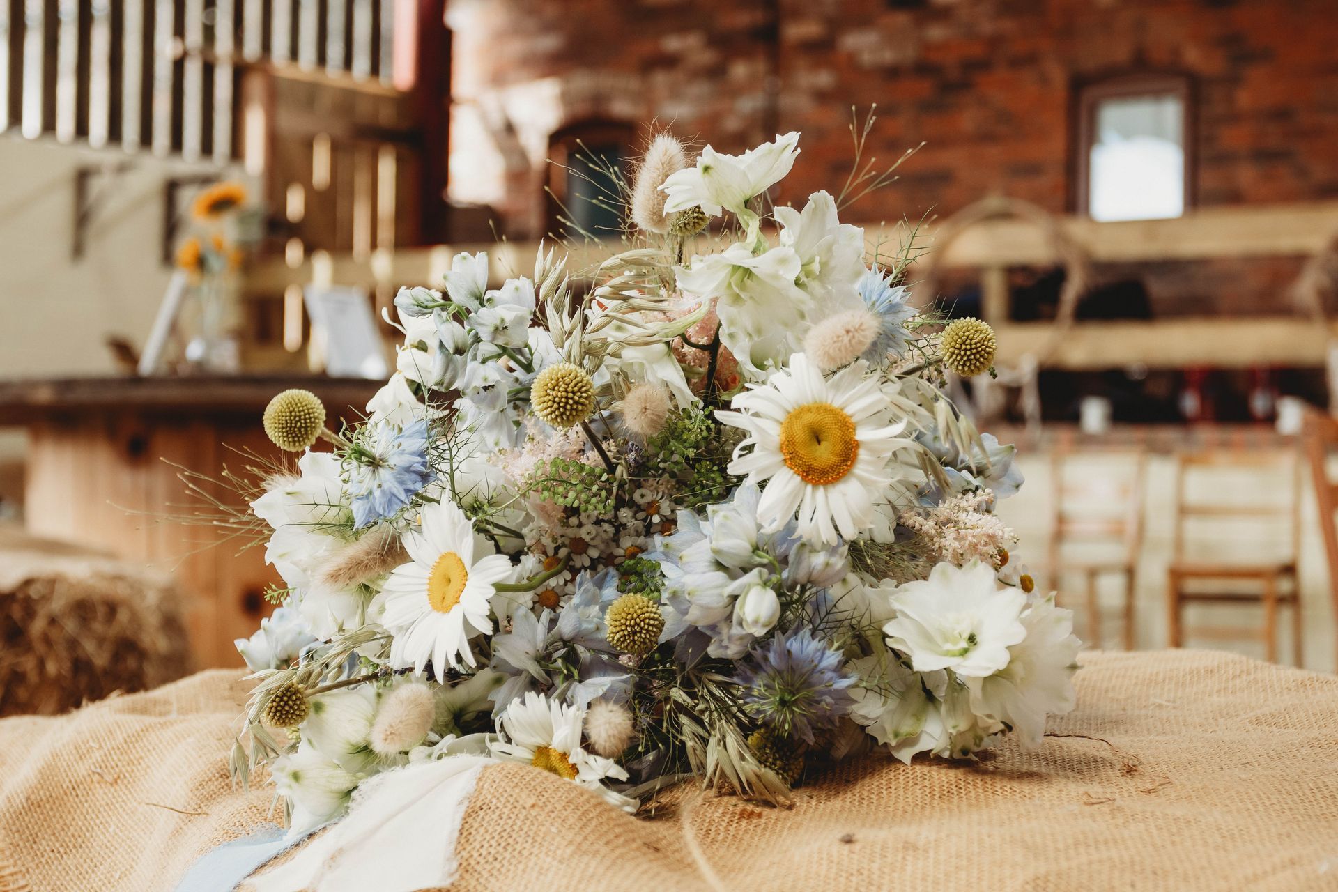 A bouquet of flowers is sitting on a table.
