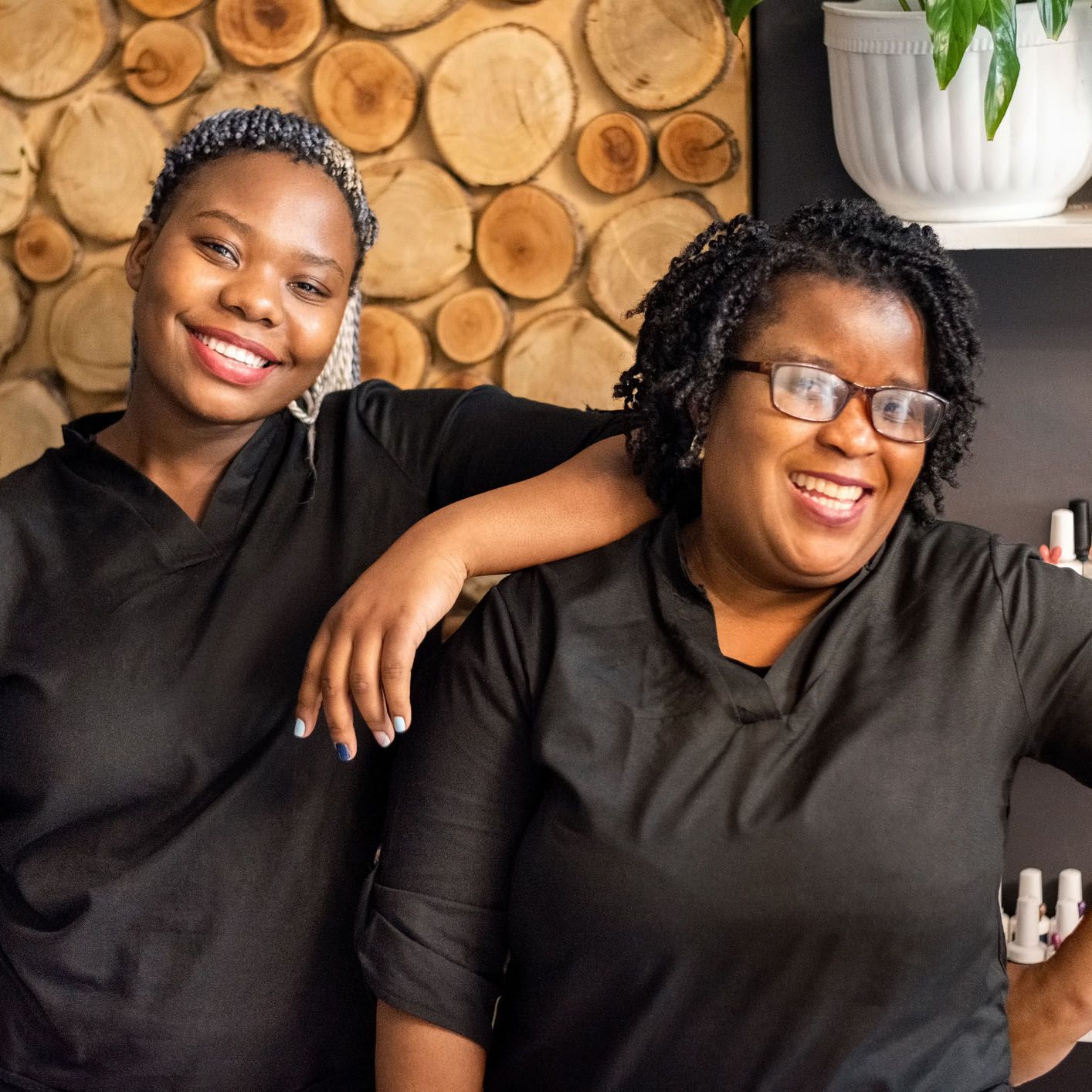 Two stylists standing together — New Carrollton, MD — Hair Academy Two stylists standing together — New Carrollton, MD — Hair Academy