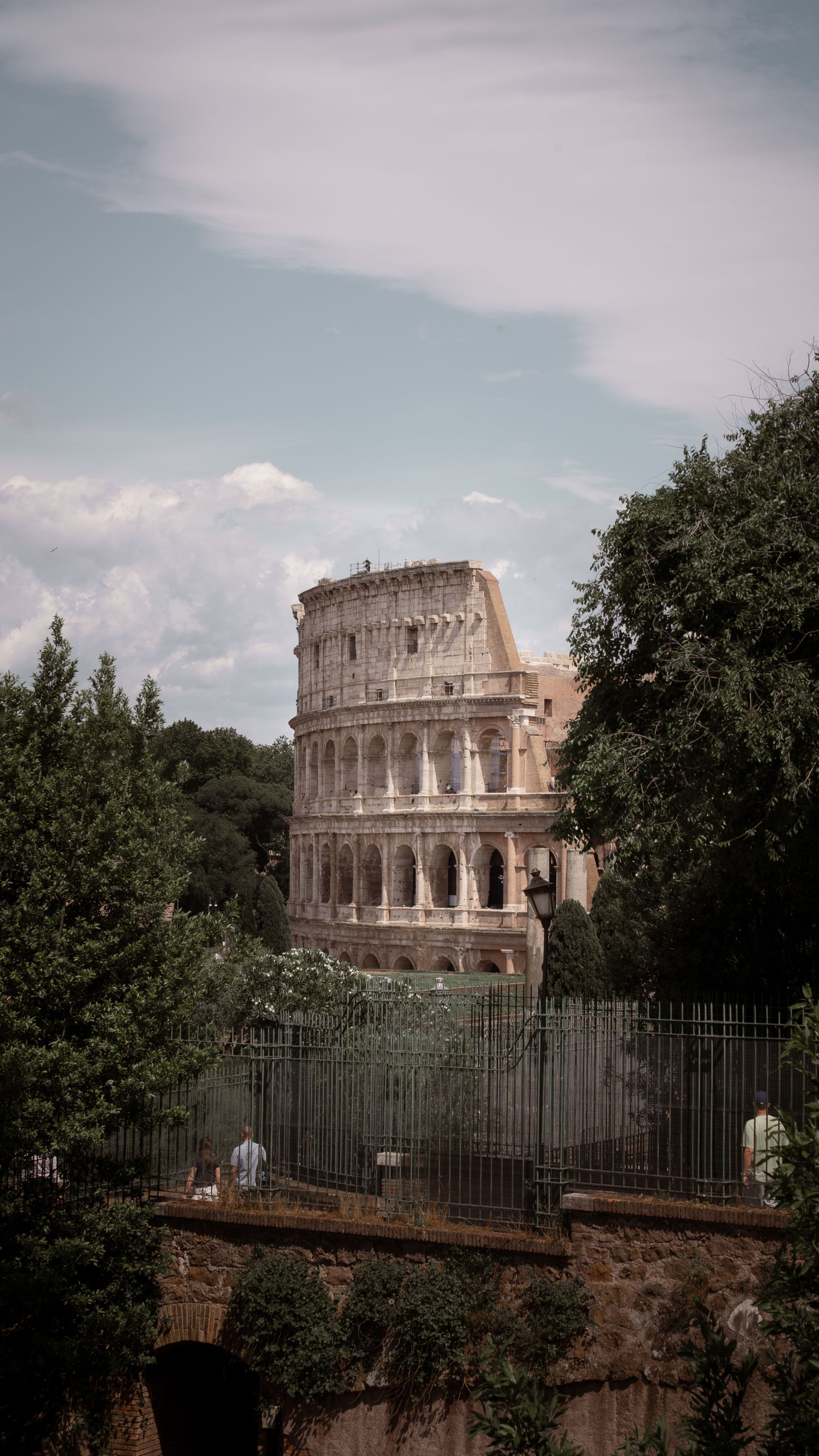 The Colosseum in Rome, Italy, viewed at a distance.