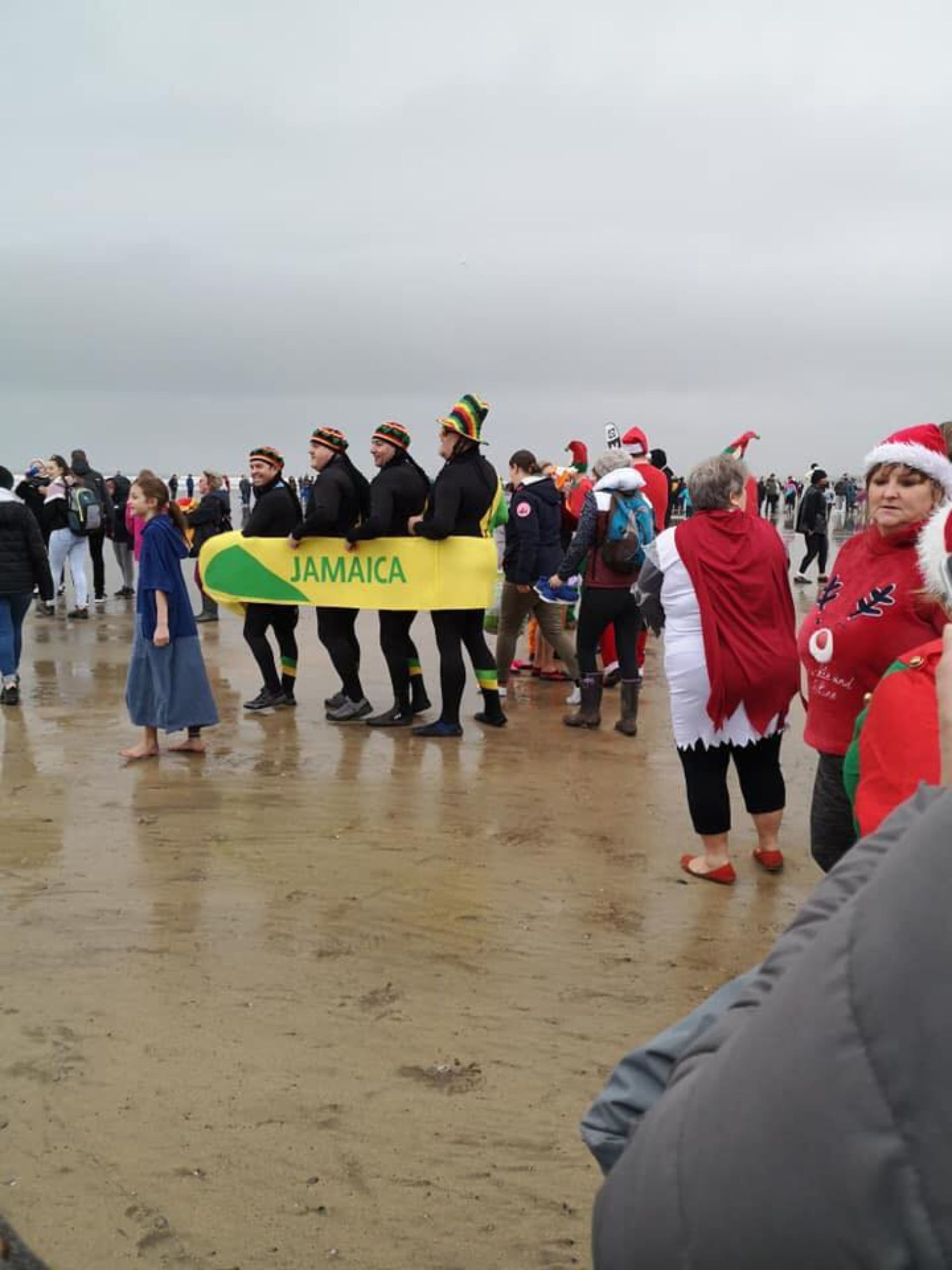 The Jamacan bob sleigh team getting ready to run into the sea at Westward Ho! for the new years day dip here. It's a wonderful way to start the year.
