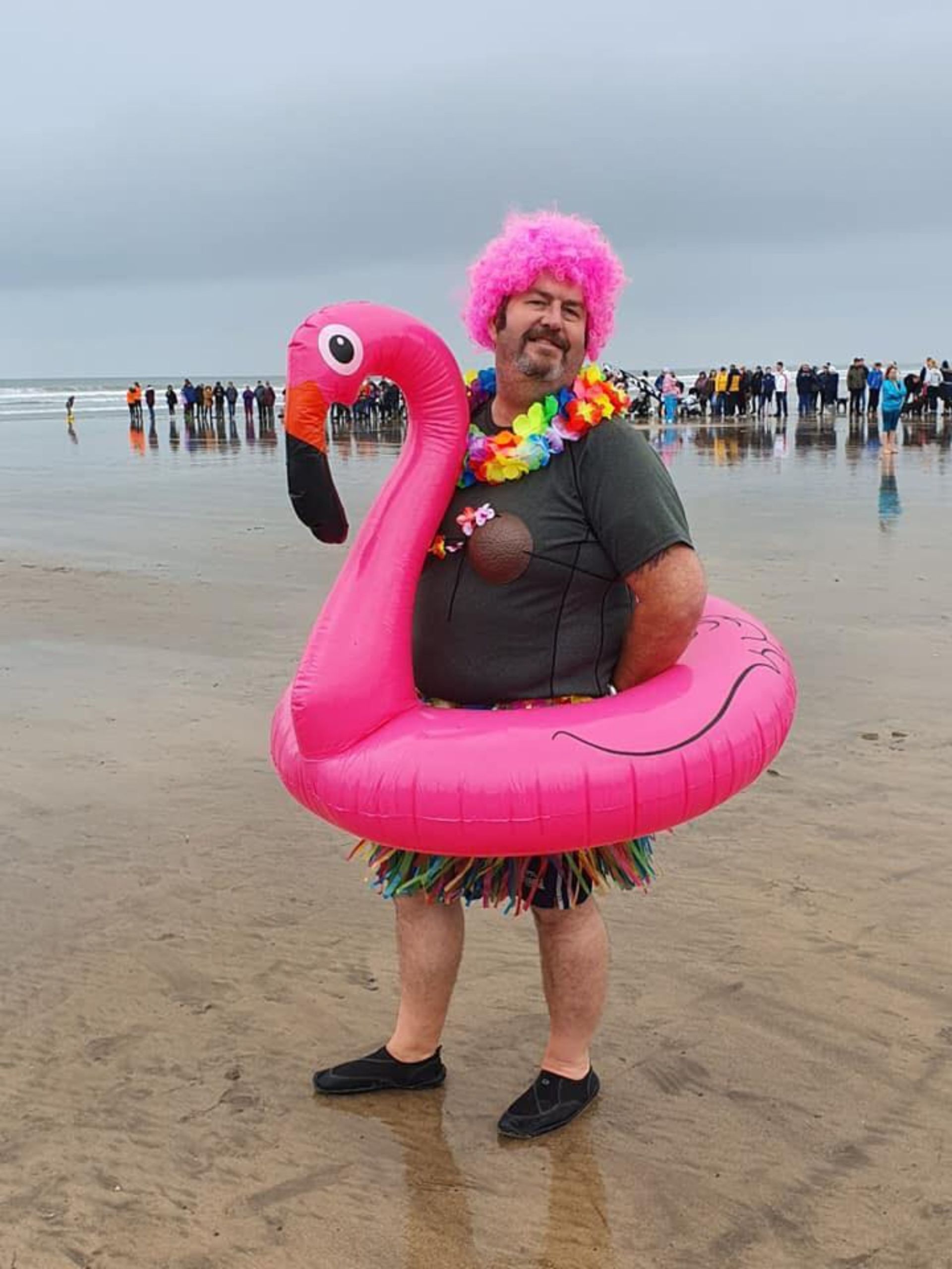 Classic moments of the new year day dip at Westward Ho! in Devon. Craig in his pink ring made many people smile at this wonderful event in the South West of England