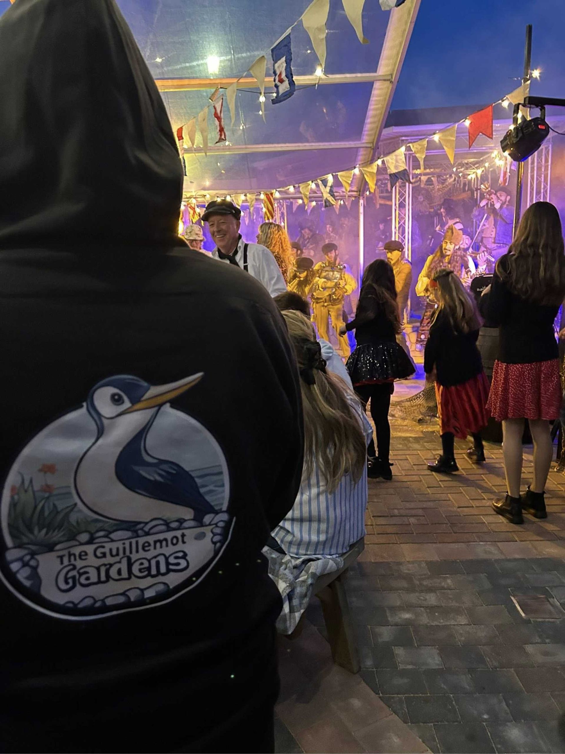 The Old Time Sailors playing live at the Guillemot Gardens in Westward Ho! Devon. This live music venue hosts many local and national acts.