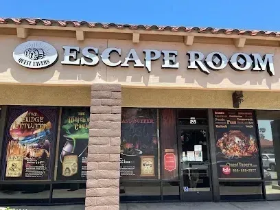 Tree Removal Service West Covina -The Quest Taverns Escape Room storefront features large, metallic signage above windows displaying posters for themed escape games like 