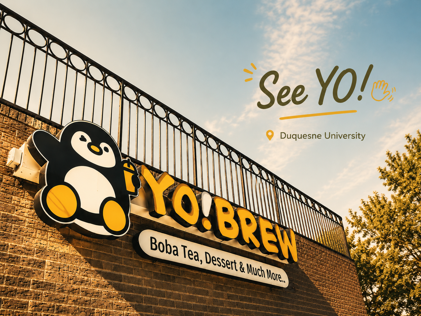 Yellow-and-black YO! Brew sign with a penguin mascot and “See YO!a” text on a fence.