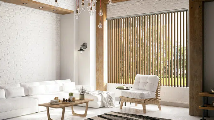 a living room with a couch , chair , coffee table and window with norman shutters Love is Blinds Missouri (314) 808-3440.