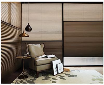 Love is Blinds St. Louis: A living room with a chair , table , rug and roman shades.
