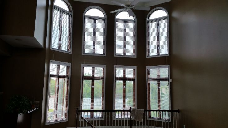 Love is Blinds MO - Traditional Window Blinds for a hall of windows.