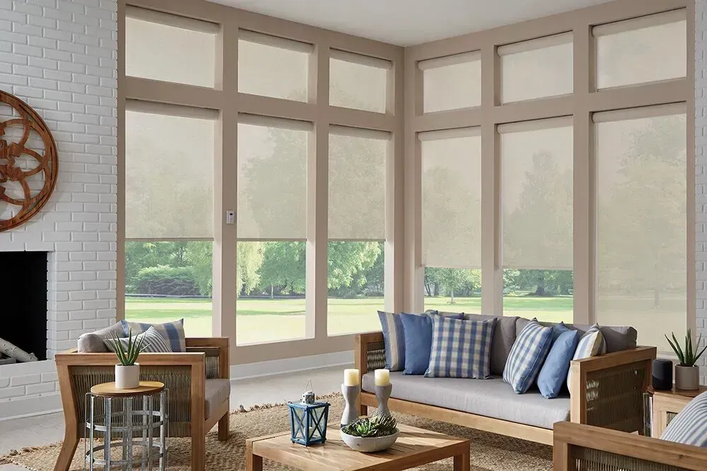 Love is Blinds St. Louis: A living room with a chair and a window with cellular shades.