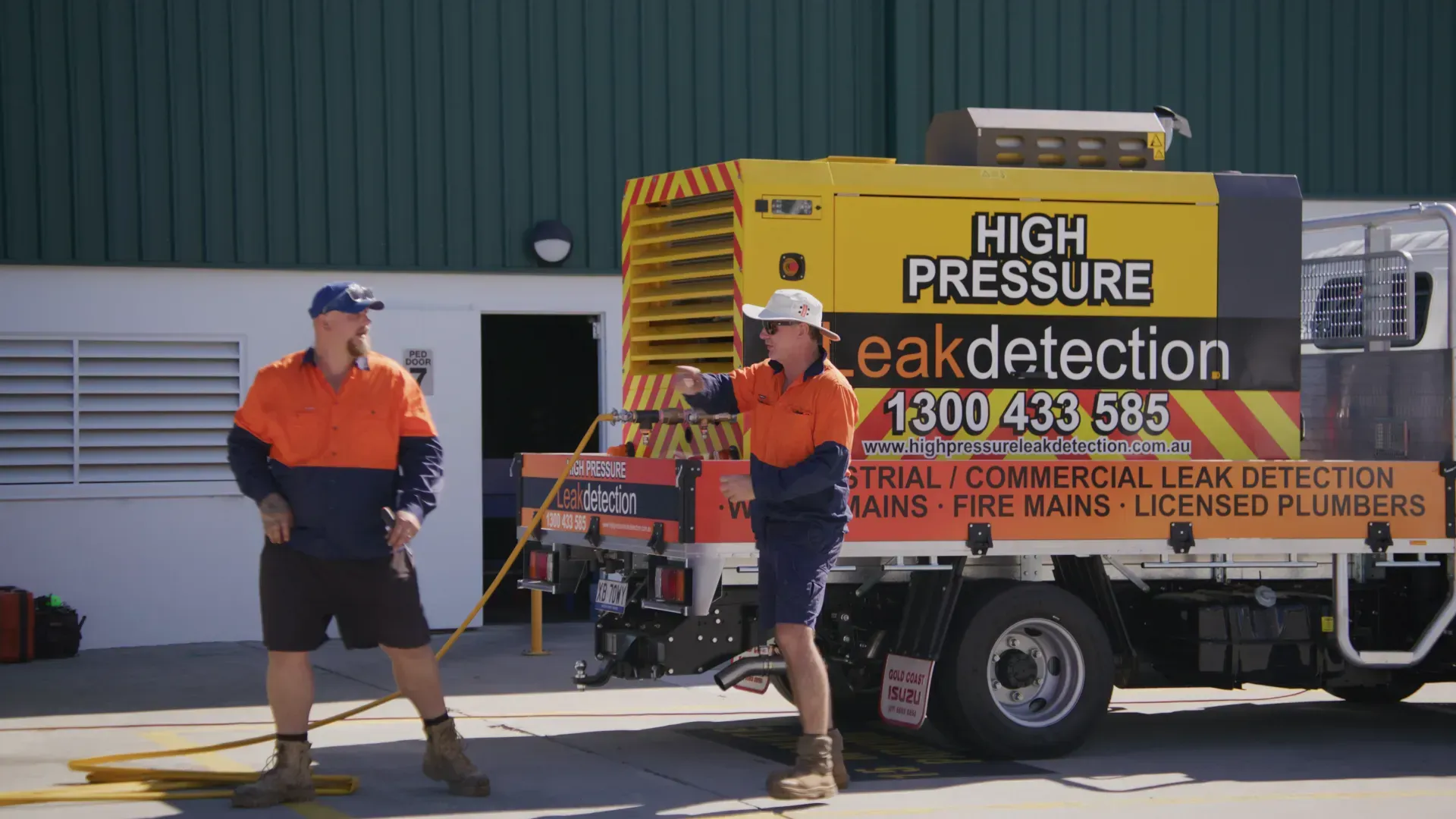 Two workers near a 