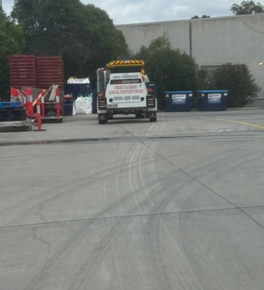 Fire Mains Leak Detection Truck Parked Near Rubbish Bins &mdash; Commercial Leak Detection in Mudgeeraba, QLD