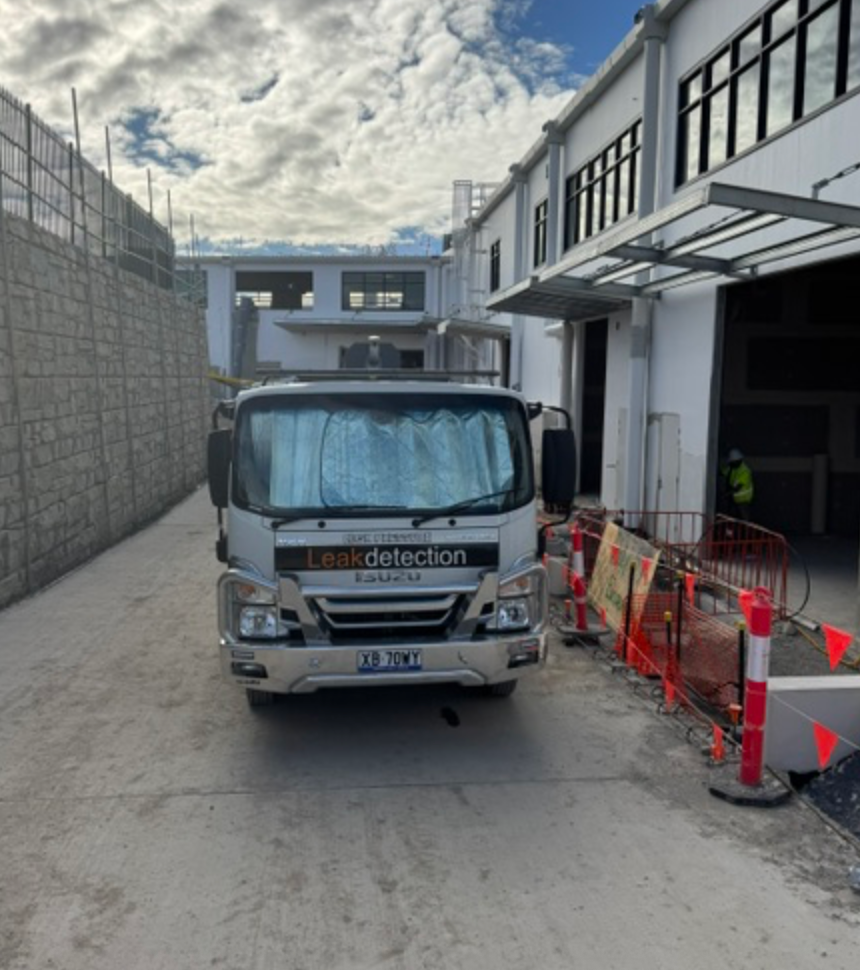 Leak Detection Truck Parked Beside Warehouse Under Construction &mdash; Commercial Leak Detection in Mudgeeraba, QLD