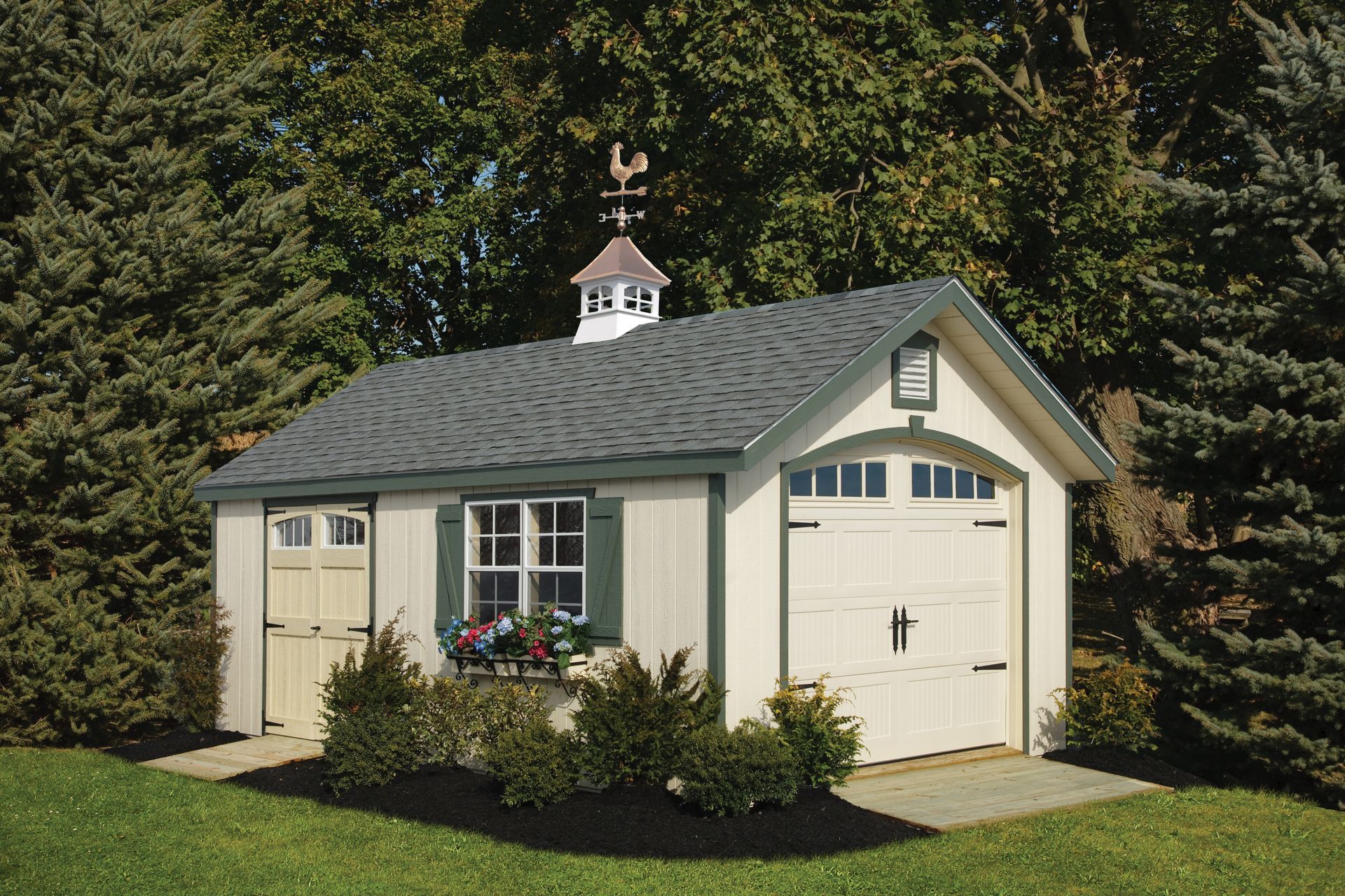 Small beige garden shed with white trim and garage-style door in a wooded yard