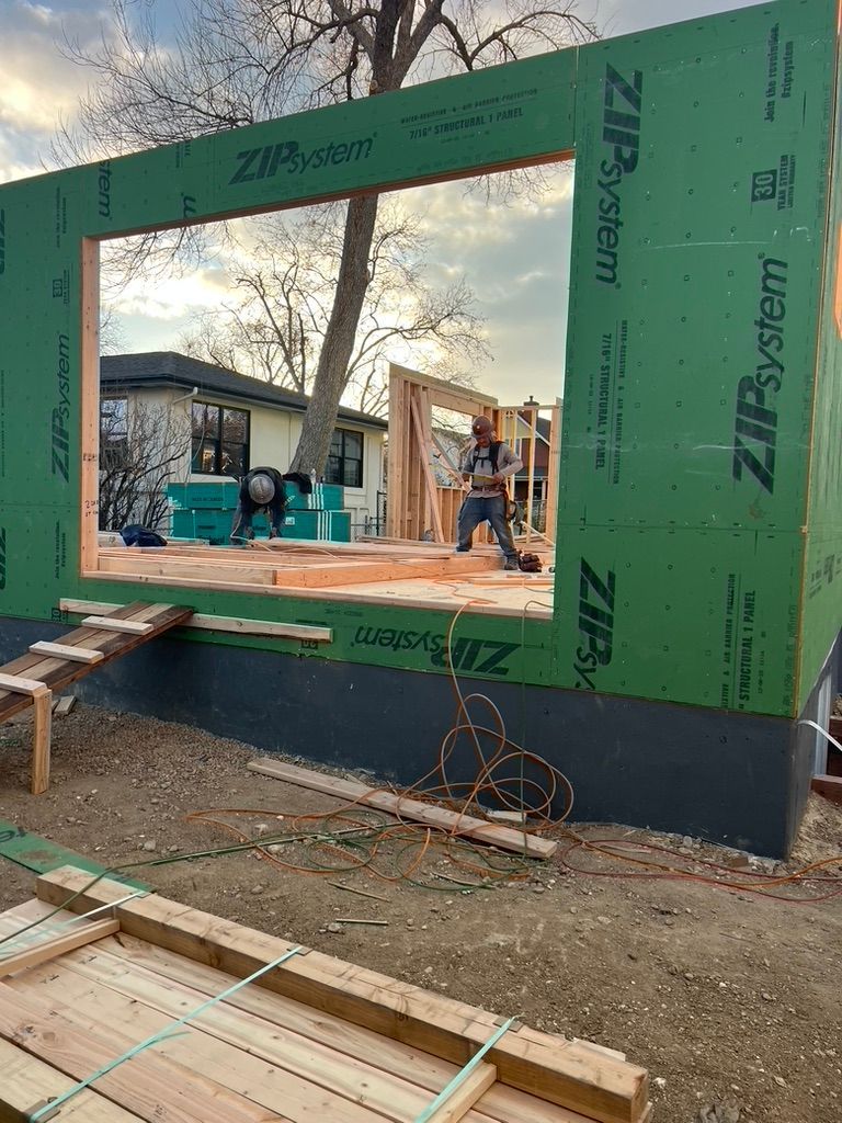 Exterior wall framing and sheathing at 1234 Jefferson Avenue during construction