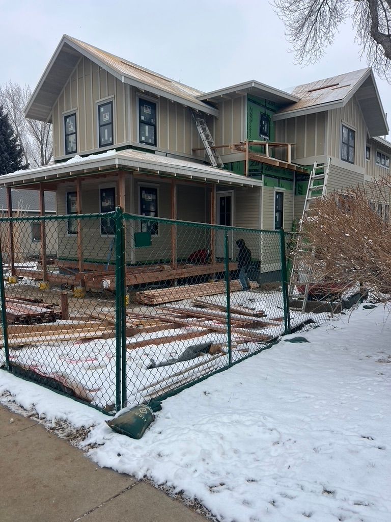 Two-story house at 1234 Jefferson Avenue during exterior construction