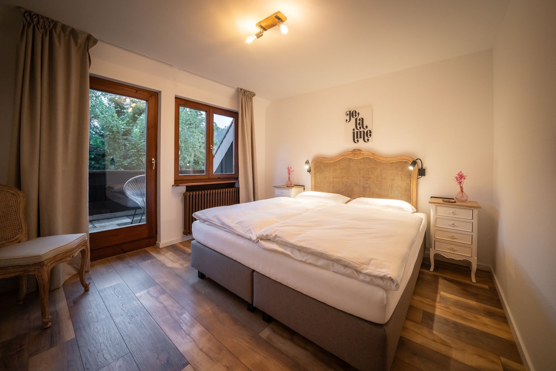 There is a large bed in the middle of the room.