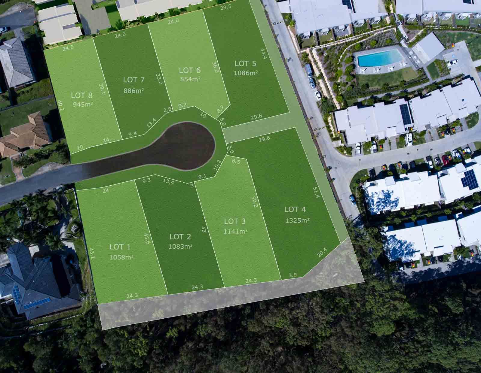 An Aerial View Of A Residential Area With Lots Of Green Grass — Harrison Development Group In Surfers Paradise, QLD
