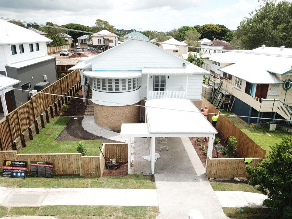 An Aerial View Of A House With A White Roof โ Harrison Development Group In Surfers Paradise, QLD