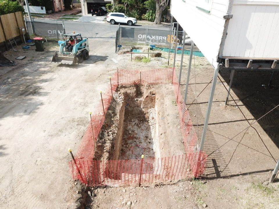 An Aerial View Of A Construction Site With A Fence Around It โ Harrison Development Group In Surfers Paradise, QLD