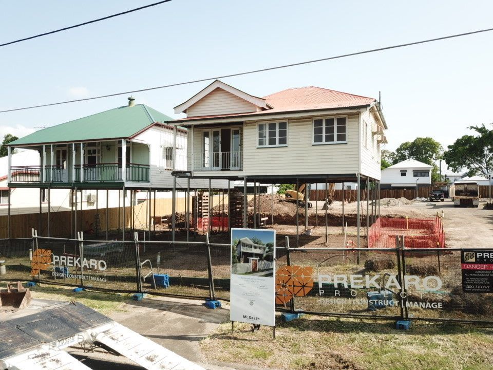 A Fenced Area With A Sign Prekaro โ Harrison Development Group In Surfers Paradise, QLD