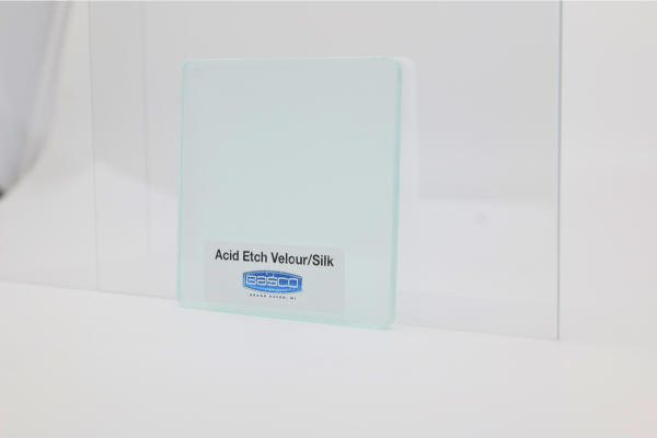 A frosted glass sample labeled 