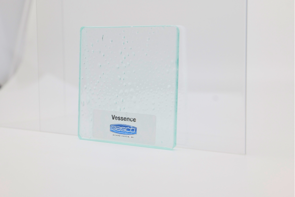 A textured glass sample labeled 
