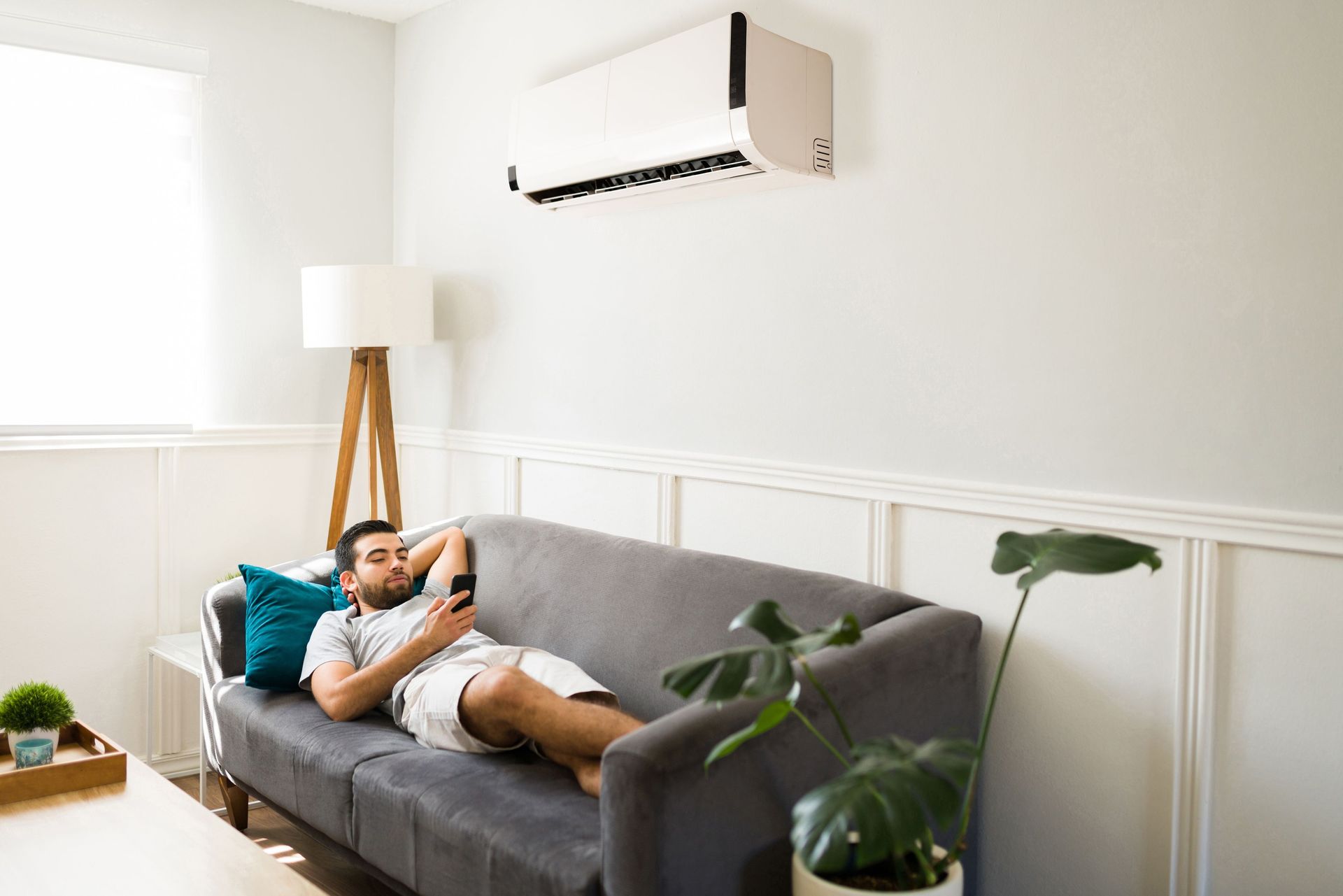 relaxed hispanic man lying on couch