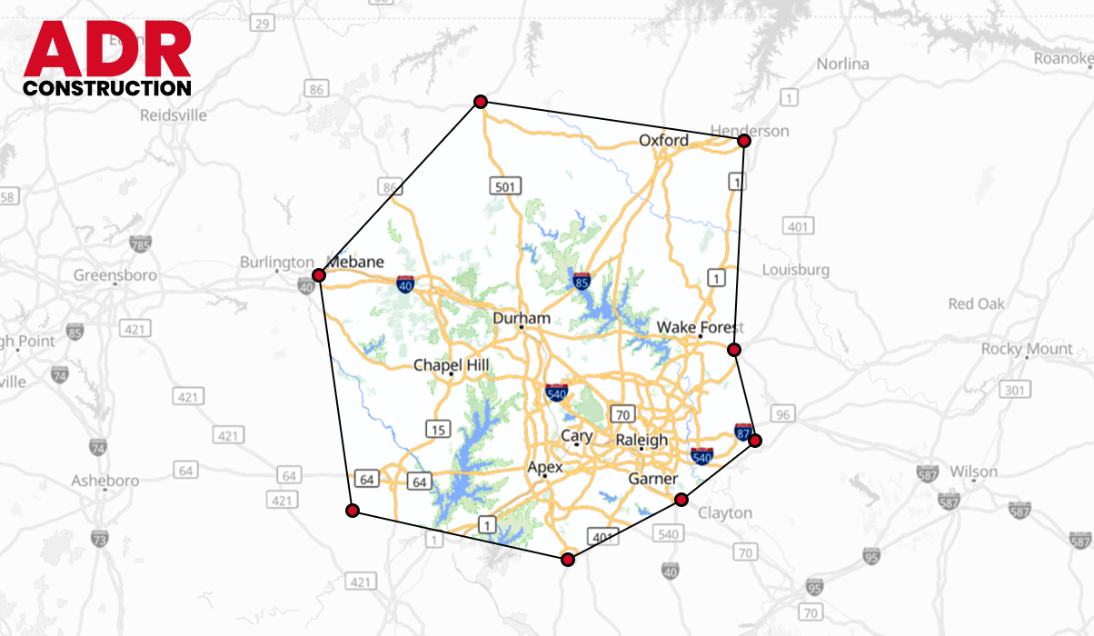 Map with highlighted route and red markers, branded ADR Construction logo in the top left.