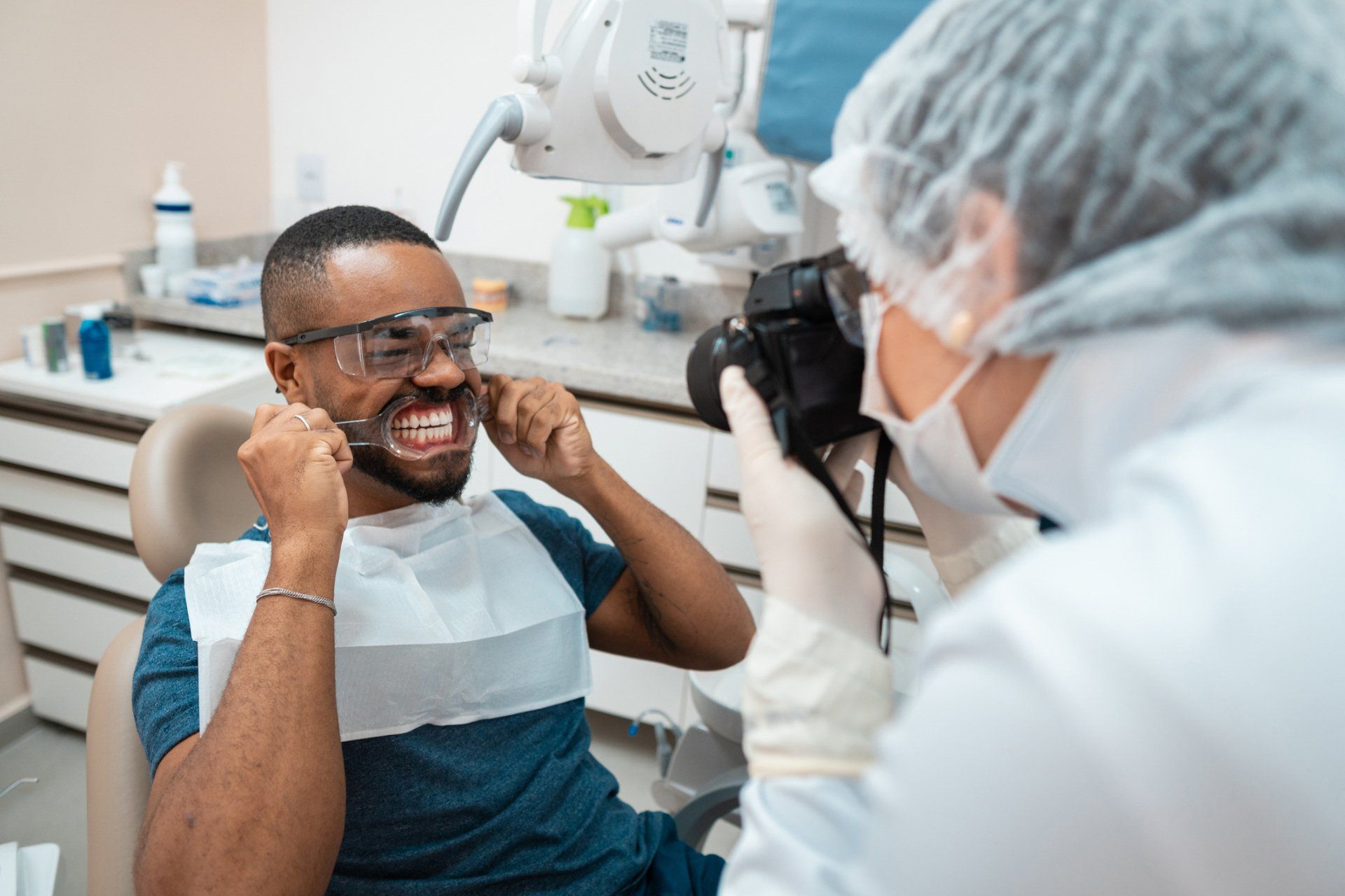 Taking Photo Of Patient Teeth — Hampton, VA — Artisan Smiles Dental