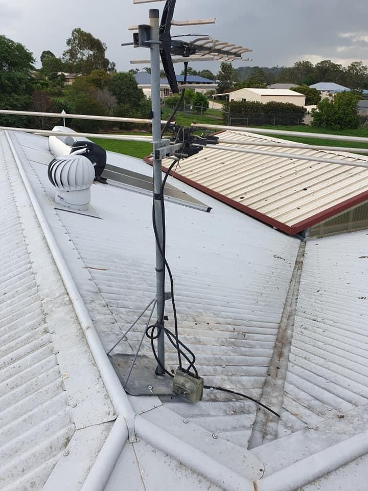 An Antenna Is Sitting On Top Of A White Roof — Highfields Antennas In Blackbutt, QLD
