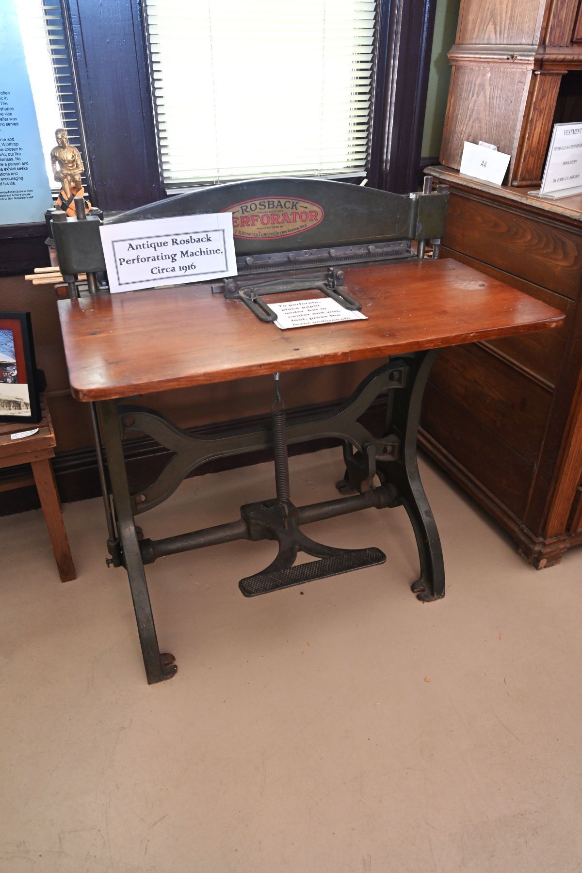 Antique preforating machine displayed at the conway county history museum in morrilton ar