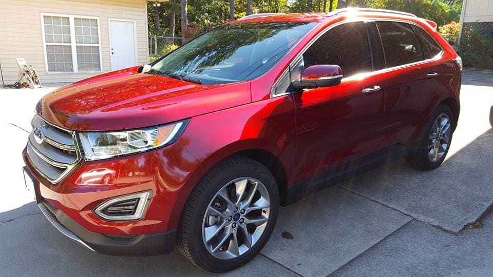 Red Car on Garage - Automobile Window Tinting in Knoxville, TN