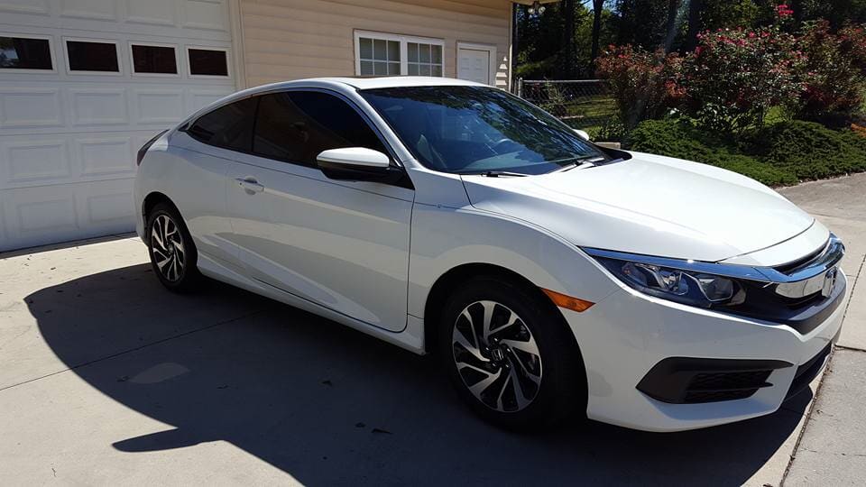 White Car in Front of Garage - Automobile Window Tinting in Knoxville, TN
