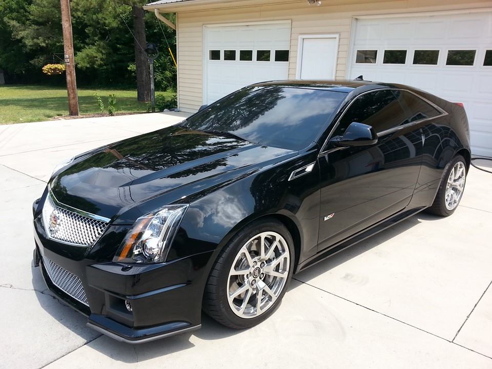Black Car in Front of Garage - Automobile Window Tinting in Knoxville, TN