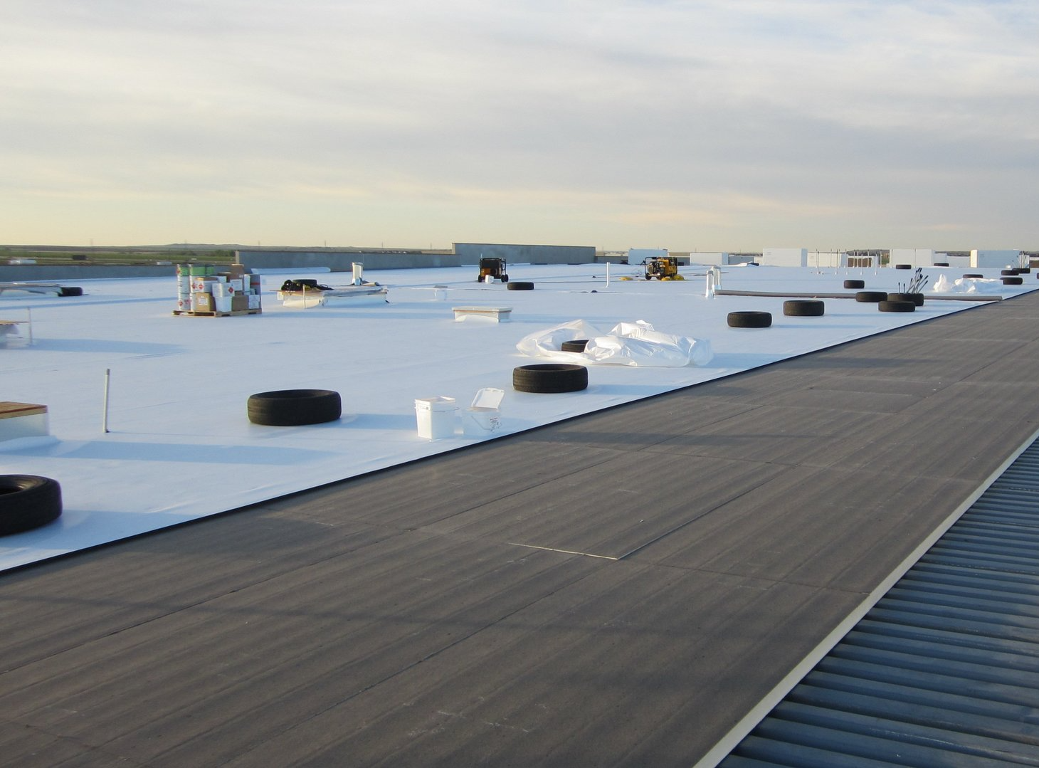 A roof with a lot of tires on it