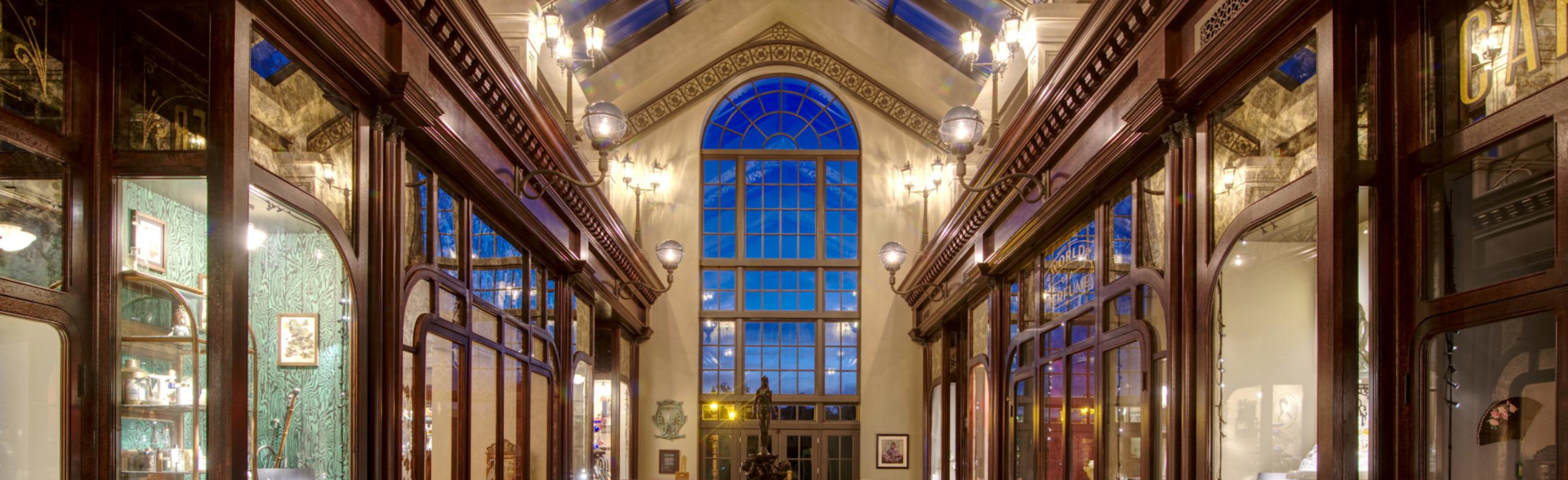 There is a large window in the middle of the building.