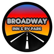 Broadway Inn & RV Park logo: circular, road at sunset, with text 
