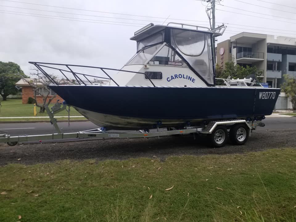 Dark Blue Boat on a Trailer — Drop Deck Trailers In Gympie QLD
