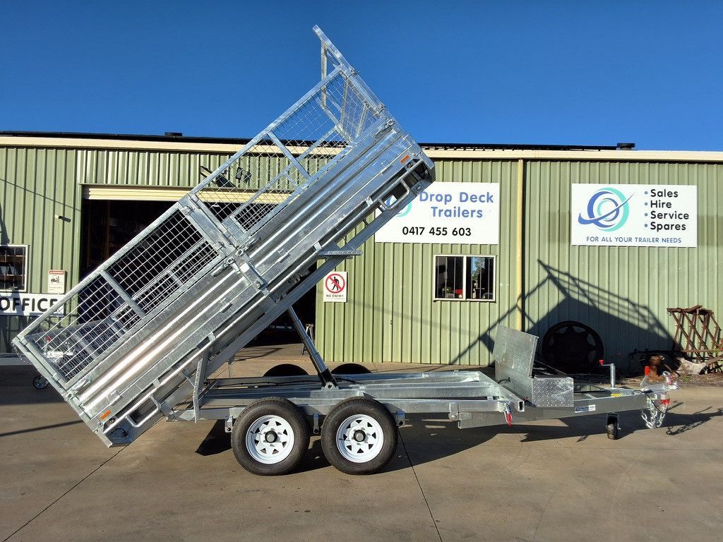 Tipper Trailer in Front Of Green Building — Drop Deck Trailers In Urangan QLD